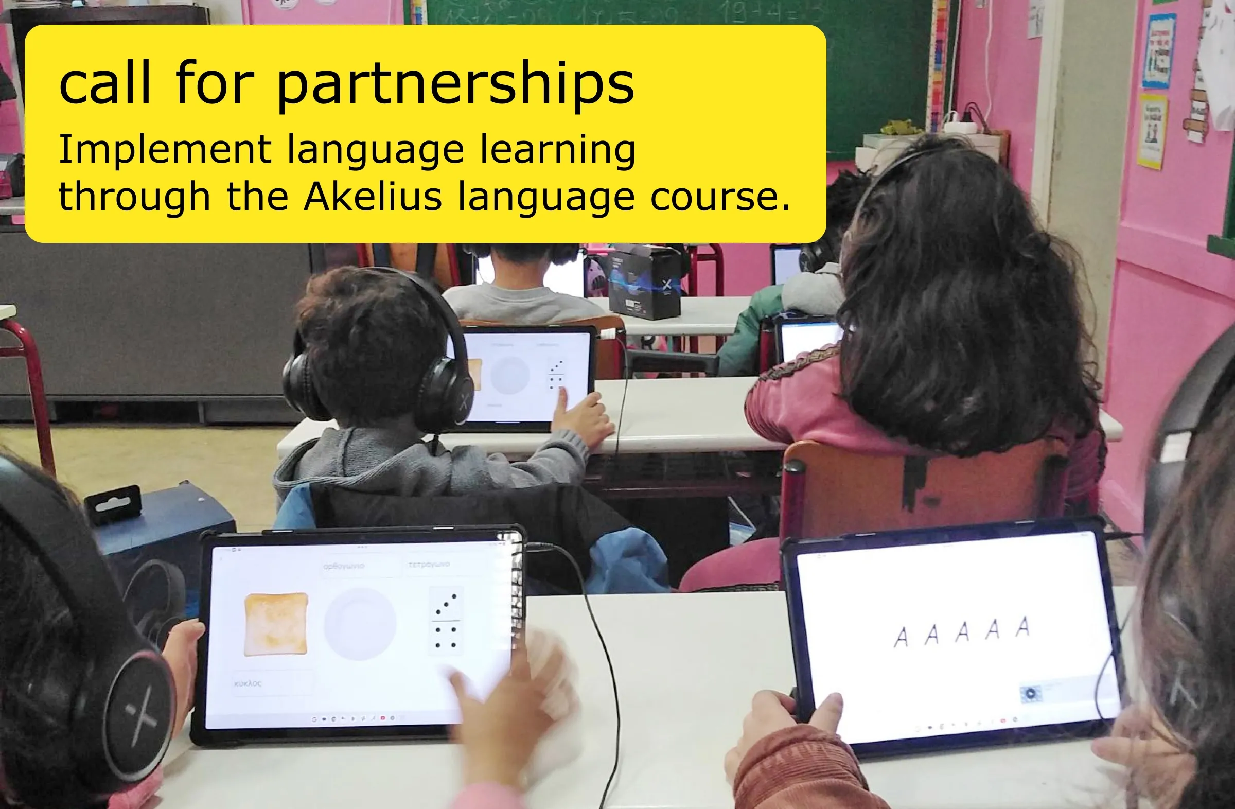 Children using tablets for a language-learning course
